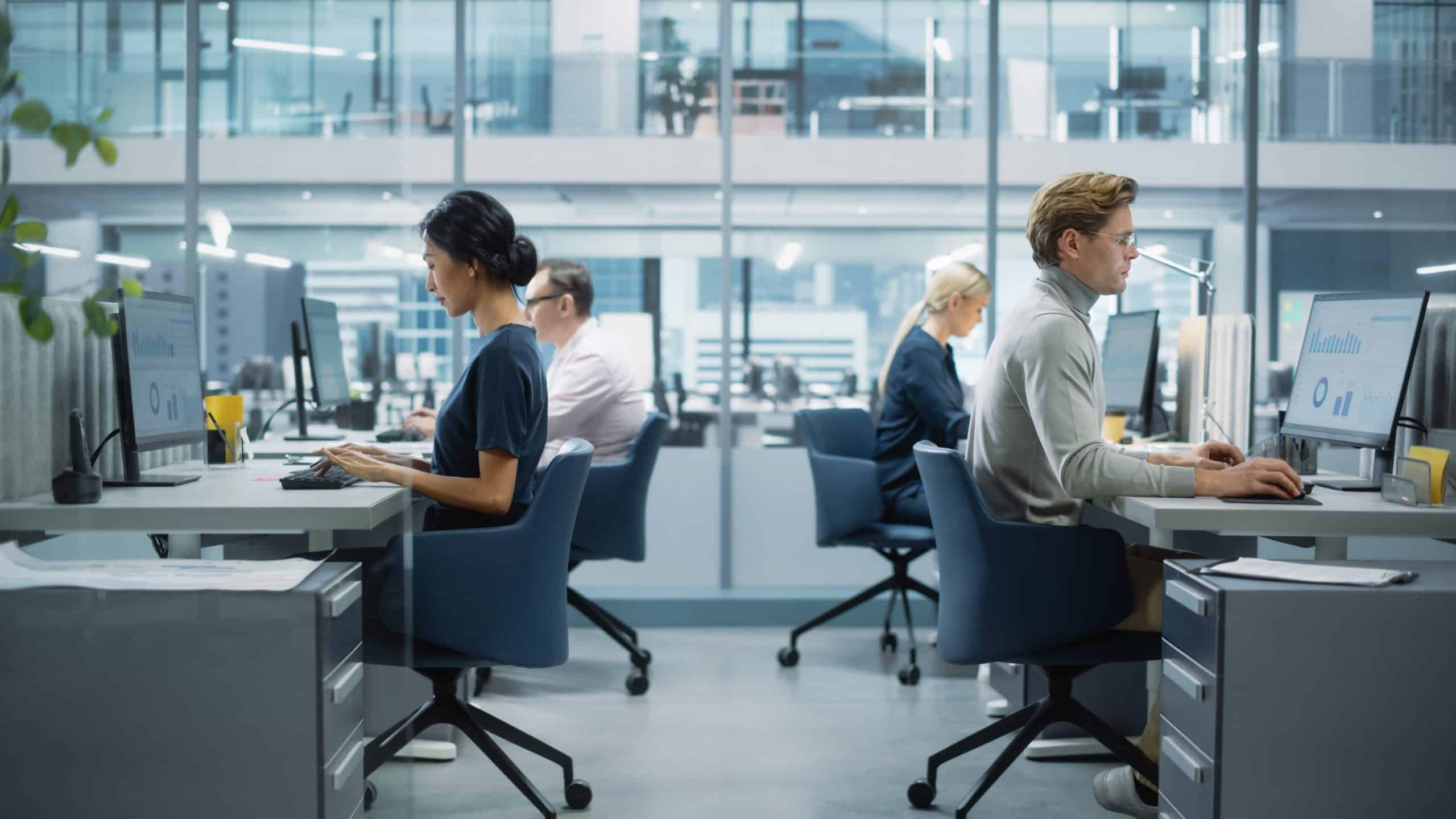 Diverse,Team,Of,Finance,Managers,Working,With,Statistical,Data,In