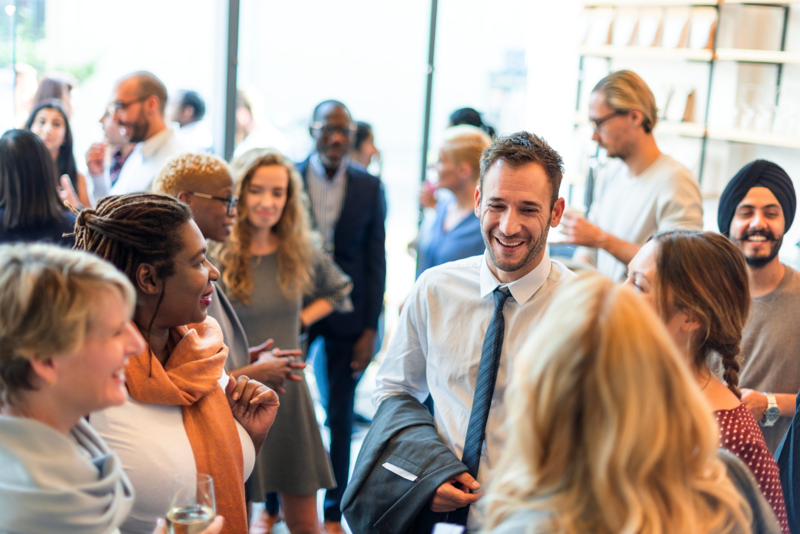 Diverse,Group,Of,People,Networking,At,A,Social,Event.,Men